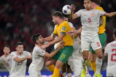 australias cameron burgess jumps for the ball next to indonesias rizky ridho during the 2026 1725972249581